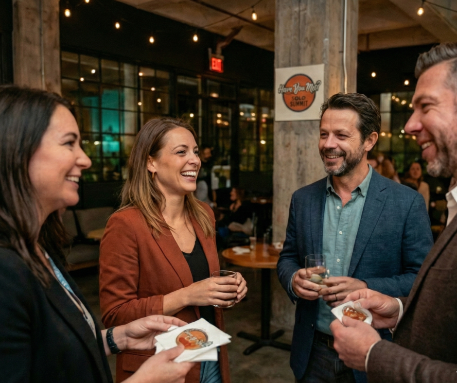 Adults talking and connecting at an in-person Have You Met? event