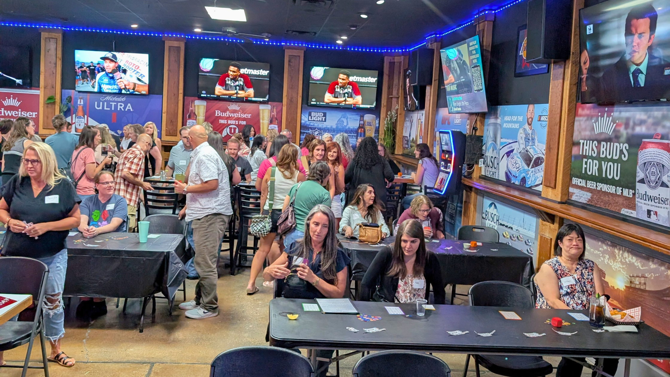 Singles Mingle Bingo Night in Salt Lake City Singles talking and playing bingo at a Have You Met? Events gathering in Salt Lake City