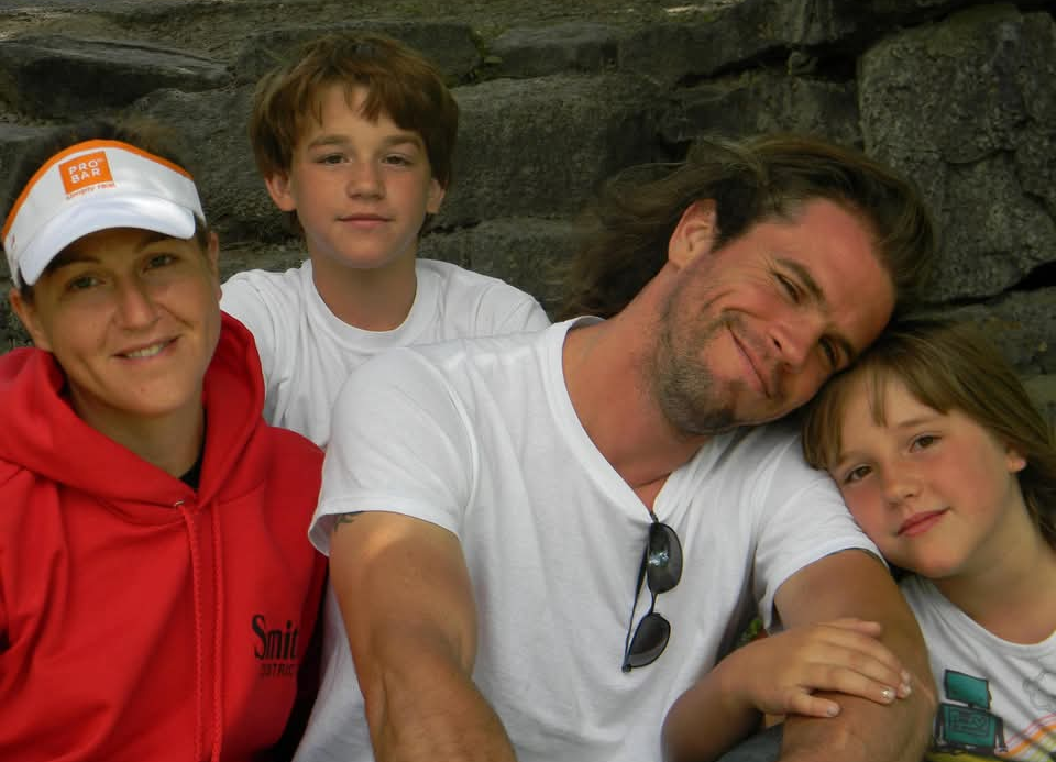 Molly Bitton with her husband Derek and their two children in a family photo
